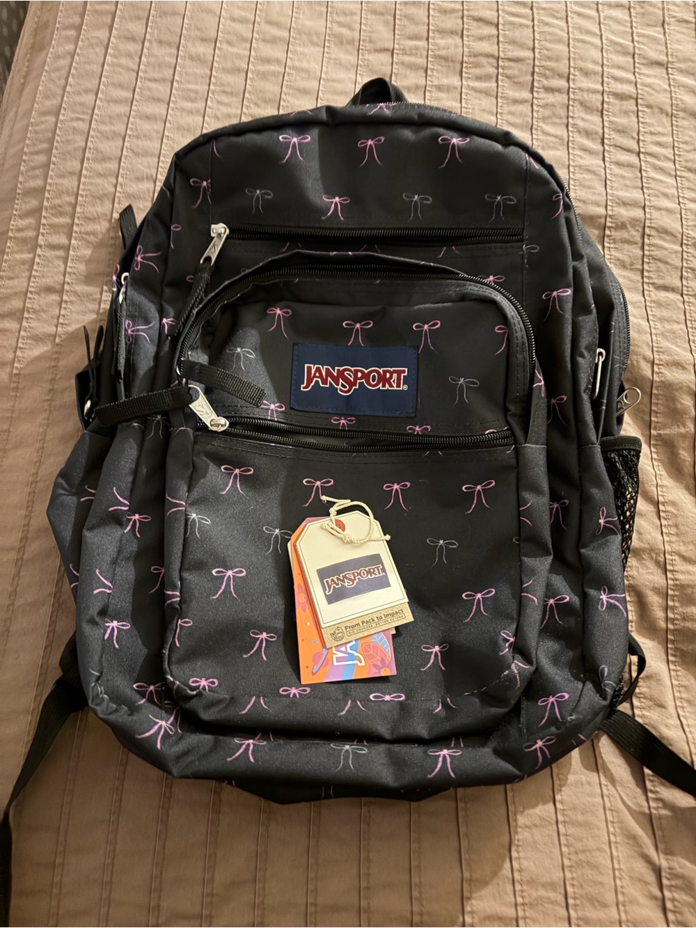 Jansport Black Backpack with Pink Bow Print